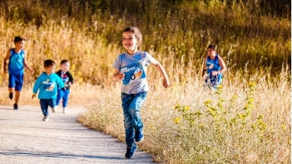 children enjoying running outside
