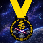 May the 4th themed running medal with yellow ribbon, lightsabers and stormtrooper design on a space background